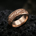 Load image into Gallery viewer, Rose gold plated sterling silver dove band on volcanic stone, intricate bird motif engraving with deep contrast and smooth edges, minimal high-end close-up.
