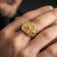 Load image into Gallery viewer, Sterling silver medieval knight statement ring worn on a finger, close-up lifestyle photo showcasing the gold plated finish and Templar-inspired heraldic shield motif