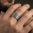 Load image into Gallery viewer, Polished silver nature wildlife engraved band ring on finger, crisp jungle scene relief with botanical detail, refined everyday wear close-up.