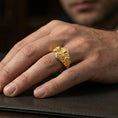 Load image into Gallery viewer, Gold plated Saint Jude signet ring worn on finger, detailed saint portrait relief with “God Bless” and “Save Us” engraving, premium lifestyle jewelry photo.