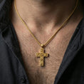 Load image into Gallery viewer, Gold plated rose cross pendant worn on the neck in a premium lifestyle composition with a clean and elegant Christian jewelry styling