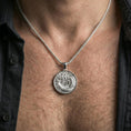 Load image into Gallery viewer, Polished silver oriental dragon medallion pendant necklace worn on the neck, clean lifestyle wear shot capturing bright reflections and the highly detailed dragon motif.