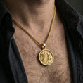 Load image into Gallery viewer, Gold plated dragon medallion pendant necklace worn on the neck, lifestyle photo featuring warm tone finish and strong statement medallion presence.