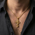 Load image into Gallery viewer, Gold plated gothic cross necklace with scripted Only God Can Judge Me wording worn on the neck in a premium lifestyle composition with strong devotional styling