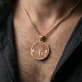 Load image into Gallery viewer, Rose gold plated Yggdrasil tree of life pendant necklace worn on the neck, lifestyle wear shot with elegant rosy shine and crisp Celtic knot border detailing visible.