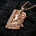 Load image into Gallery viewer, Rose gold plated Freyr and Gullinbursti pendant necklace on textured volcanic rock, centered studio-style close-up showcasing soft rosy glow and intricate Viking knotwork with clear rune accents.