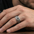 Load image into Gallery viewer, Oxidized wolf head band ring worn on a finger, lifestyle framing showing realistic scale and bold vintage contrast in a natural hand pose.