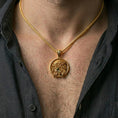 Load image into Gallery viewer, Gold plated Jesus Christ pendant with crown of thorns and flowing profile detail worn on the neck in a premium lifestyle composition with timeless Christian jewelry styling
