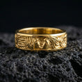 Load image into Gallery viewer, Gold plated lovers face ring on volcanic stone, premium macro shot showing warm gold tone across the romantic portrait and engraved scrollwork sides.