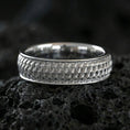Load image into Gallery viewer, Oxidized sterling silver geometric weave band ring on volcanic stone, macro close-up emphasizing the interlocking lattice texture and dark antique contrast.
Polished silver geometric weave band ring on volcanic stone, crisp product photo highlighting the clean shine and repeating woven pattern detail.