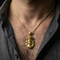 Load image into Gallery viewer, Gold plated Jesus Christ necklace with crown of thorns and bust-style portrait worn on the neck in a premium lifestyle composition with timeless Christian jewelry styling
