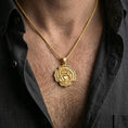 Load image into Gallery viewer, Gold plated heart chakra necklace with sacred center motif and structured lotus form worn on the neck in a premium lifestyle composition with elegant spiritual jewelry styling