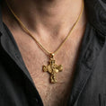 Load image into Gallery viewer, Gold plated Saint Michael necklace with angel warrior motif and Quis Ut Deus detail worn on the neck in a premium lifestyle composition with strong Christian jewelry styling