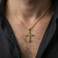 Load image into Gallery viewer, Gold plated Celtic cross pendant with ornate knot motif worn on the neck in a premium lifestyle composition with timeless spiritual jewelry styling