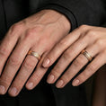 Load image into Gallery viewer, Rose gold plated bark texture band ring worn on the finger, lifestyle image showing elegant rose tone, subtle highlights on the bark relief, and gift-ready premium feel.