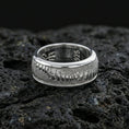 Load image into Gallery viewer, Polished silver lizard skin spinner ring on volcanic stone, sharp macro photo emphasizing bright shine, smooth edges, and crisp scale detailing on the spinning center.