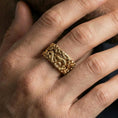 Load image into Gallery viewer, Gold plated dragon cloud band ring worn on the finger, lifestyle photo emphasizing rich gold glow, strong dragon symbolism, and premium visual impact.