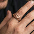 Load image into Gallery viewer, Koi fish sterling silver band ring worn on a finger, rose gold plated look with refined warmth and clear definition in the koi fish and wave motif.