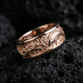 Load image into Gallery viewer, Rose gold plated sterling silver dragon and koi fish ring on volcanic stone, detailed relief scene with strong contrast, minimal high-end close-up.