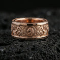 Load image into Gallery viewer, Rose gold plated sterling silver lion head band on volcanic stone, detailed lion relief and symmetrical Gothic engraving, minimal high-end close-up.