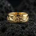 Load image into Gallery viewer, Gold plated mountain landscape band ring on volcanic rock, detailed peak relief and textured valley scene, luxury jewelry product photography.