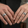 Load image into Gallery viewer, Polished silver dove engraved band ring on finger, crisp pigeon motif with flowing vine detail, refined everyday wear close-up.
