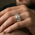 Load image into Gallery viewer, Polished silver jaguar fidget spinner ring on finger, crisp big cat relief scene on rotating band, refined everyday wear close-up.