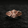 Load image into Gallery viewer, Rose gold plated sterling silver Saint Jude ring on volcanic stone, sculpted saint portrait relief with bold engraved text panels, minimal high-end close-up.