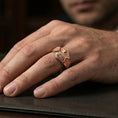 Load image into Gallery viewer, Rose gold plated Saint Jude ring worn on finger, sculpted saint icon relief with bold text panels, elegant lifestyle wear shot.