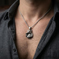 Load image into Gallery viewer, Oxidized panda pendant with bamboo detail worn on the neck in a lifestyle jewelry shot, styled against the chest for a playful and nature-inspired look
