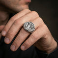 Load image into Gallery viewer, A polished 925 sterling silver Greek signet ring worn on the finger, statement jewelry with Perseus and Medusa design.
