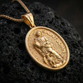 Load image into Gallery viewer, A gold plated Saint John the Evangelist medallion necklace on black volcanic stone, oval coin pendant with saint figure relief.
