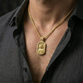 Load image into Gallery viewer, Gold plated Sacred Heart pendant with INRI inscription worn on the neck in a premium lifestyle composition with classic Christian jewelry styling