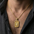 Load image into Gallery viewer, Gold plated Our Lady of Guadalupe pendant worn on the neck in a premium lifestyle composition with classic Christian jewelry styling