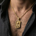 Load image into Gallery viewer, Gold plated Saint Joseph necklace with Jesus child motif worn on the neck in a premium lifestyle composition with classic Christian jewelry styling