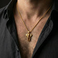 Load image into Gallery viewer, Gold plated elephant pendant necklace worn on the neck, captured on a human model in a premium dark-toned lifestyle frame.