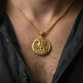 Load image into Gallery viewer, Gold plated Saint George necklace with round mounted saint motif worn on the neck in a premium lifestyle composition with classic Christian jewelry styling
