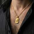 Load image into Gallery viewer, Gold plated bear pendant necklace worn on the neck, captured on a human model in a premium dark-toned lifestyle frame.