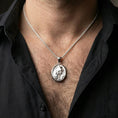 Load image into Gallery viewer, Polished silver squirrel pendant necklace worn on the neck, shown against the chest in a clean and elegant everyday wear composition.