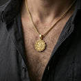 Load image into Gallery viewer, Gold plated Anahata chakra pendant with spiritual emblem and radiant border worn on the neck in a premium lifestyle composition with elegant spiritual jewelry styling