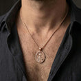 Load image into Gallery viewer, Rose gold plated Saint Nicholas pendant necklace worn on the neck, presented in a close-up lifestyle shot with a refined masculine aesthetic.