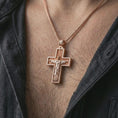 Load image into Gallery viewer, Rose gold plated Cristo Protetor cross pendant necklace worn on the neck, presented in a close-up lifestyle shot with a refined masculine aesthetic.