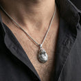 Load image into Gallery viewer, Polished silver walrus pendant necklace worn on the neck, shown against the chest in a clean and elegant everyday wear composition.