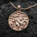 Load image into Gallery viewer, Rose gold plated mountain landscape pendant necklace on dark volcanic rock, photographed in a detailed premium studio macro view.