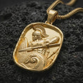 Load image into Gallery viewer, Gold plated Roman soldier pendant necklace presented on porous volcanic rock, highlighting the warrior motif in a luxurious close-up jewelry image.