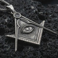 Load image into Gallery viewer, Sterling silver Master Mason pendant necklace with an oxidized finish resting on textured volcanic rock, captured in a close-up premium studio composition.