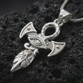 Load image into Gallery viewer, Polished silver Eye of Horus ankh pendant necklace displayed on black volcanic rock, shown in a refined macro product shot with sacred eye detail, geometric blades, and ankh-inspired top ring.