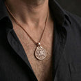 Load image into Gallery viewer, Rose gold plated Knights Templar seal pendant necklace worn on the neck, presented in a close-up lifestyle shot with a refined masculine aesthetic.