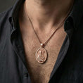 Load image into Gallery viewer, Rose gold plated Saint Patrick pendant necklace worn on the neck, presented in a close-up lifestyle shot with a refined masculine aesthetic.