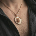Load image into Gallery viewer, Rose gold plated snarling wolf pendant necklace worn on the neck, presented in a close-up lifestyle shot with a refined wildlife-inspired aesthetic.